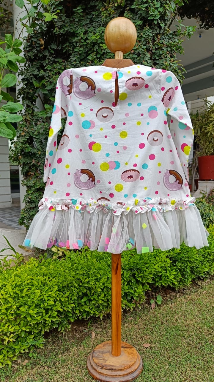 Girl wearing Anaario Dotty Donut Dress