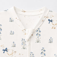 Duck & Meadow bamboo cotton baby sleepsuit — bamboo cotton onesie romper flatlay