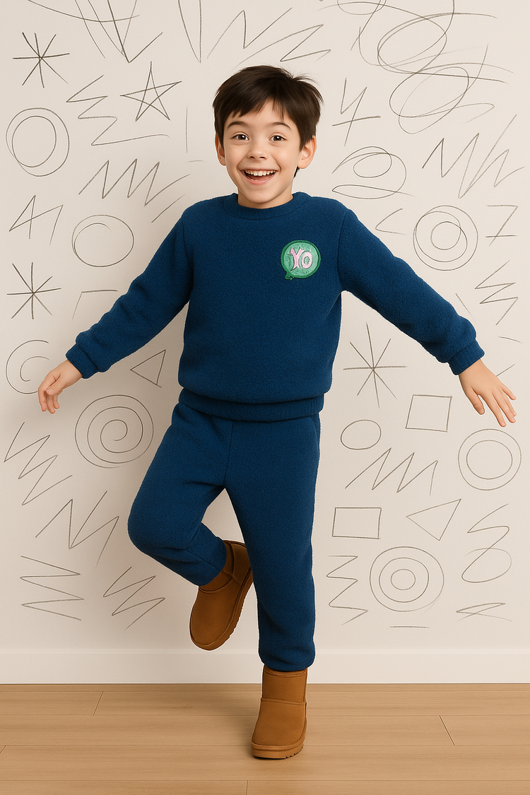 Boy wearing navy fleece set with YO patch