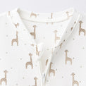 Giraffe bamboo cotton baby sleepsuit — bamboo cotton onesie romper flatlay