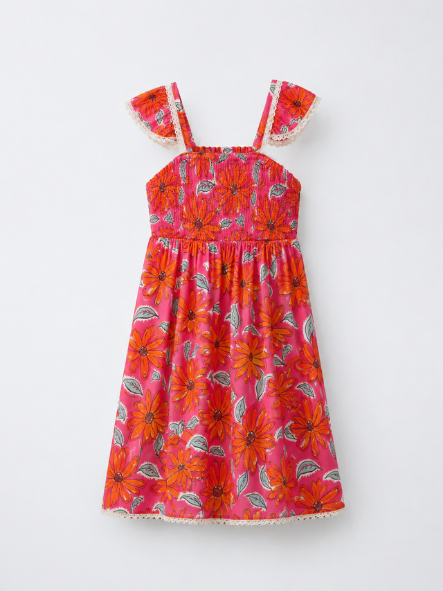 Girl wearing Anaario Coral Garden Smocked Dress