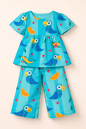 Girl wearing Anaario Parrot and Tropical Fruits Co-ord Set