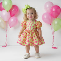 Girl wearing Anaario Magnifique Rapunzel Dress