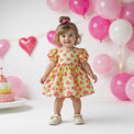 Girl wearing Anaario Magnifique Rapunzel Dress