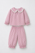 Girl wearing Anaario Pink and White Raindrops Night Suit