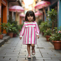Girl wearing Anaario Candy Stripe Sailor Dress