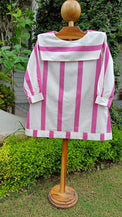 Girl wearing Anaario Candy Stripe Sailor Dress