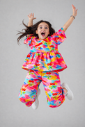 Girl wearing Anaario Splashes and Cherry Co-ord Set