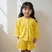 Girl wearing Anaario Yellow Alphabet Night Suit