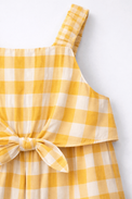 Girl wearing Anaario Honeybee Checker Jumpsuit