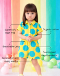 Girl wearing Anaario Canary Teal Pop Romper