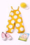 Girl wearing Anaario Lemonade Dotty Romper