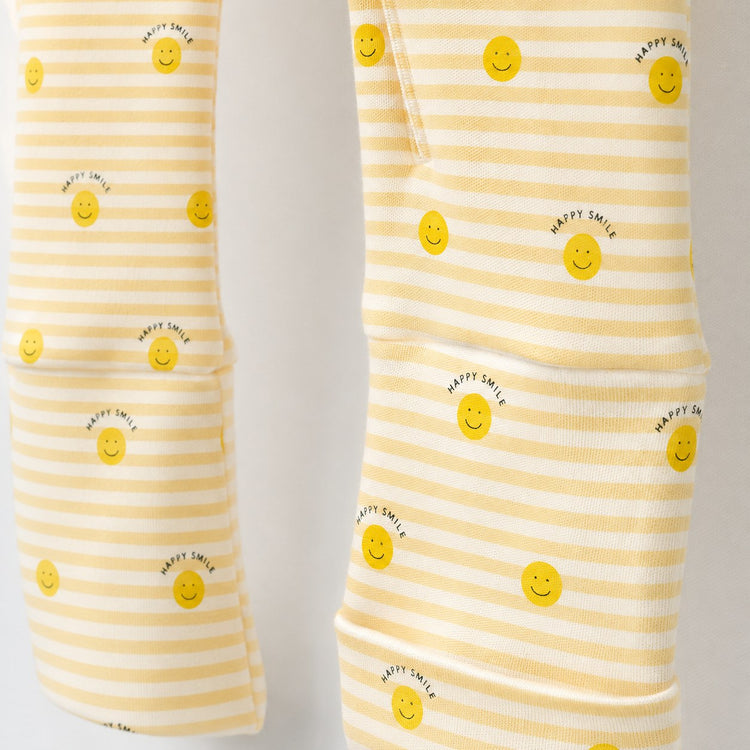Happy Sunshine bamboo cotton baby sleepsuit — bamboo cotton onesie romper flatlay