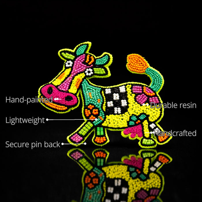 Cow Brooch features