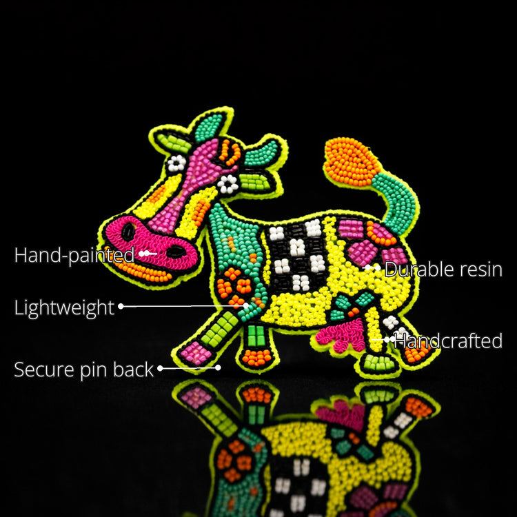 Cow Brooch features