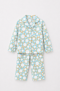 Boy wearing Anaario Ivory and Tangerine Poppy Raindrops Night Suit