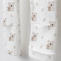 Koala & Kitty bamboo cotton baby sleepsuit — bamboo cotton onesie romper flatlay