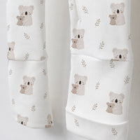 Koala & Kitty bamboo cotton baby sleepsuit — bamboo cotton onesie romper flatlay