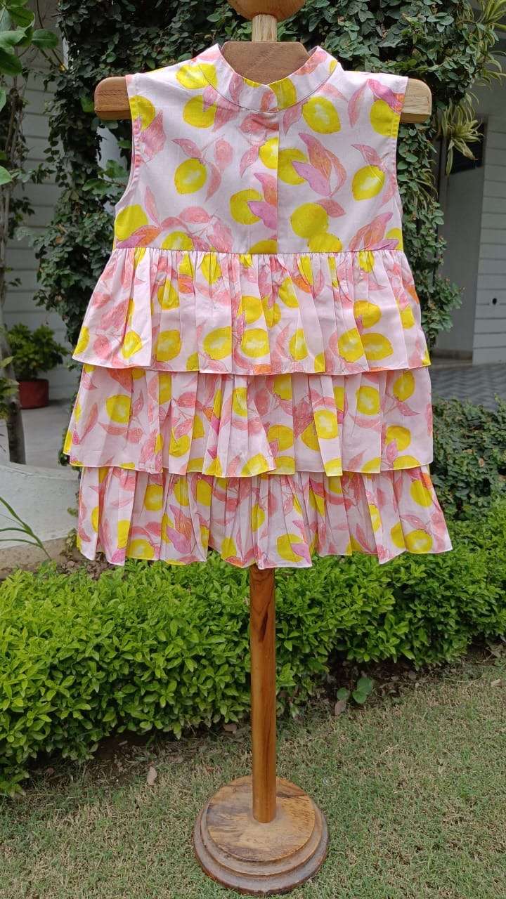 Girl wearing Anaario Lemon Zest Tier Dress