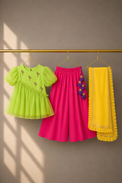 Girl wearing Anaario Lime Flamingo Peplum Palazzo Set