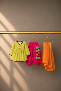Anaario Lime Dragonfly Patiala Salwar Set, lime kurta, hot pink salwar and orange dupatta on hangers