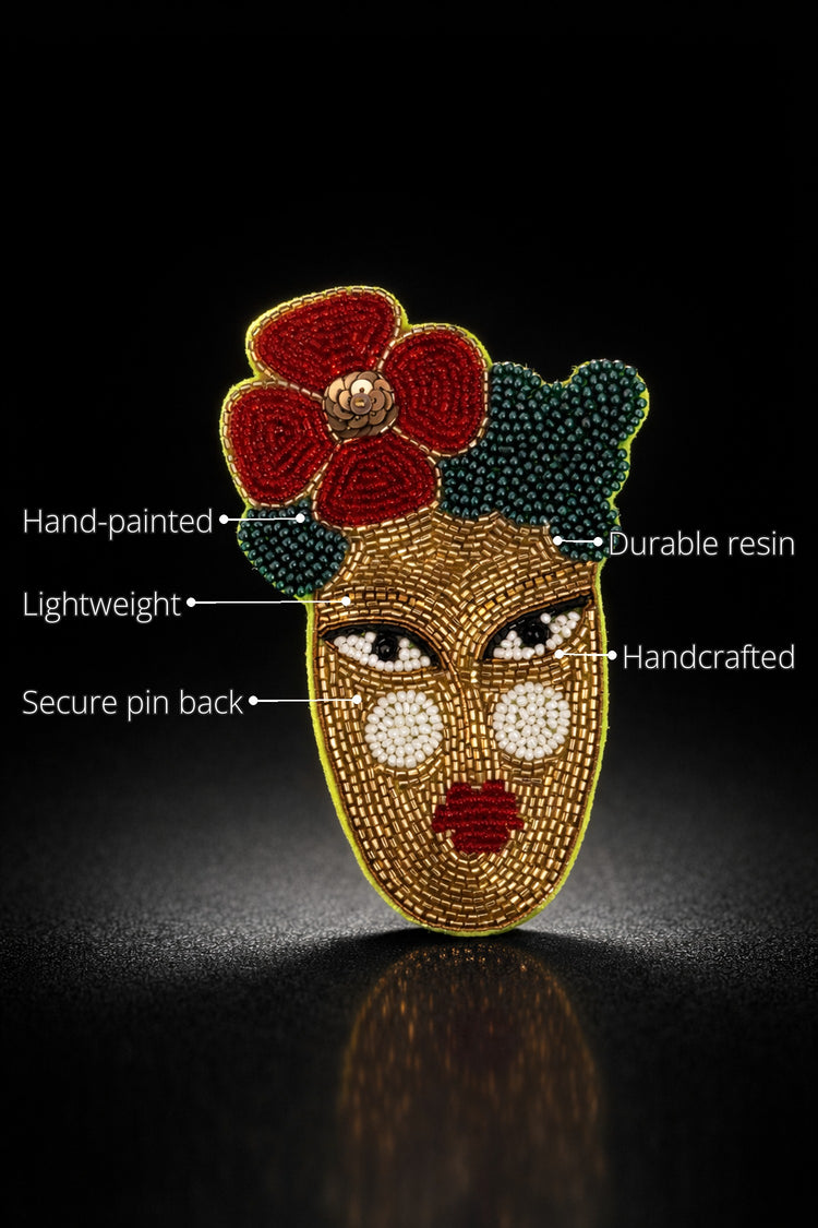 Gold Face Brooch features
