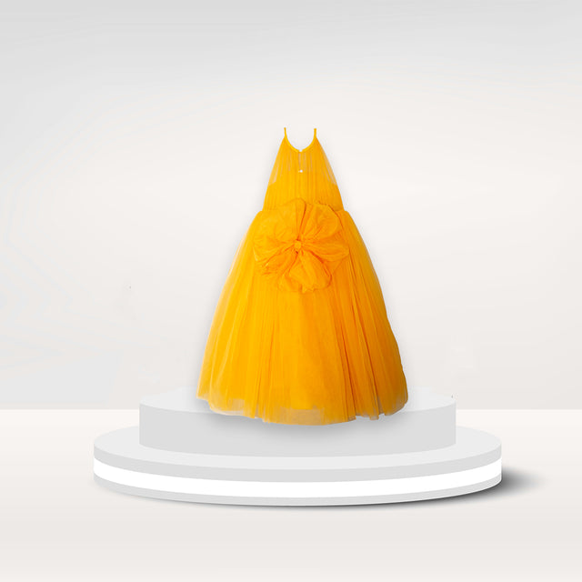 Anaario Marigold Sunshine Gown, golden orange tulle gown with sequin bodice and heart appliqué, back view