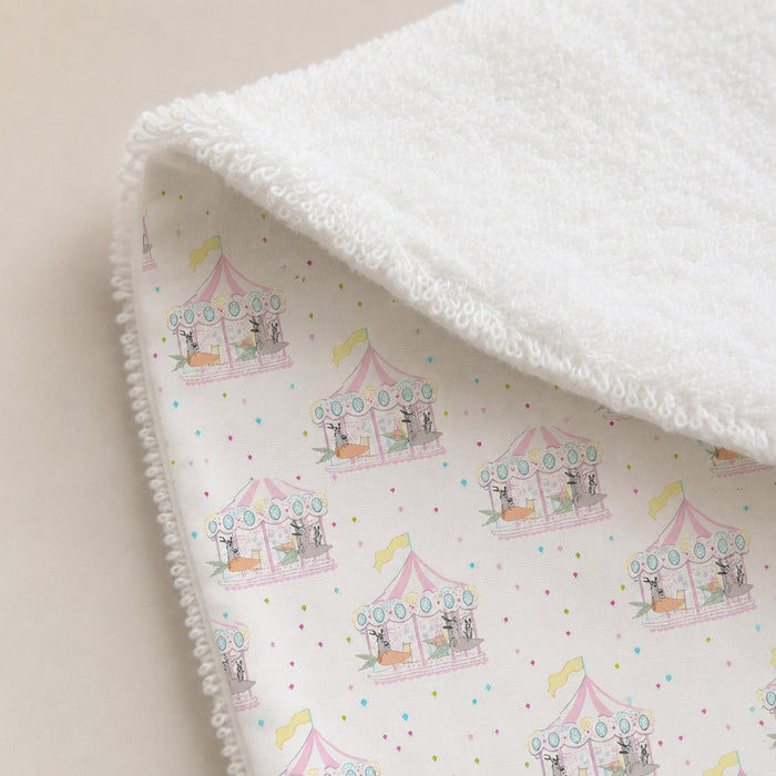 Merry-Go-Round bamboo baby bib — soft bamboo cotton flatlay