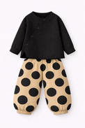 Boy wearing Anaario Midnight Dot Wrap Co-ord Set