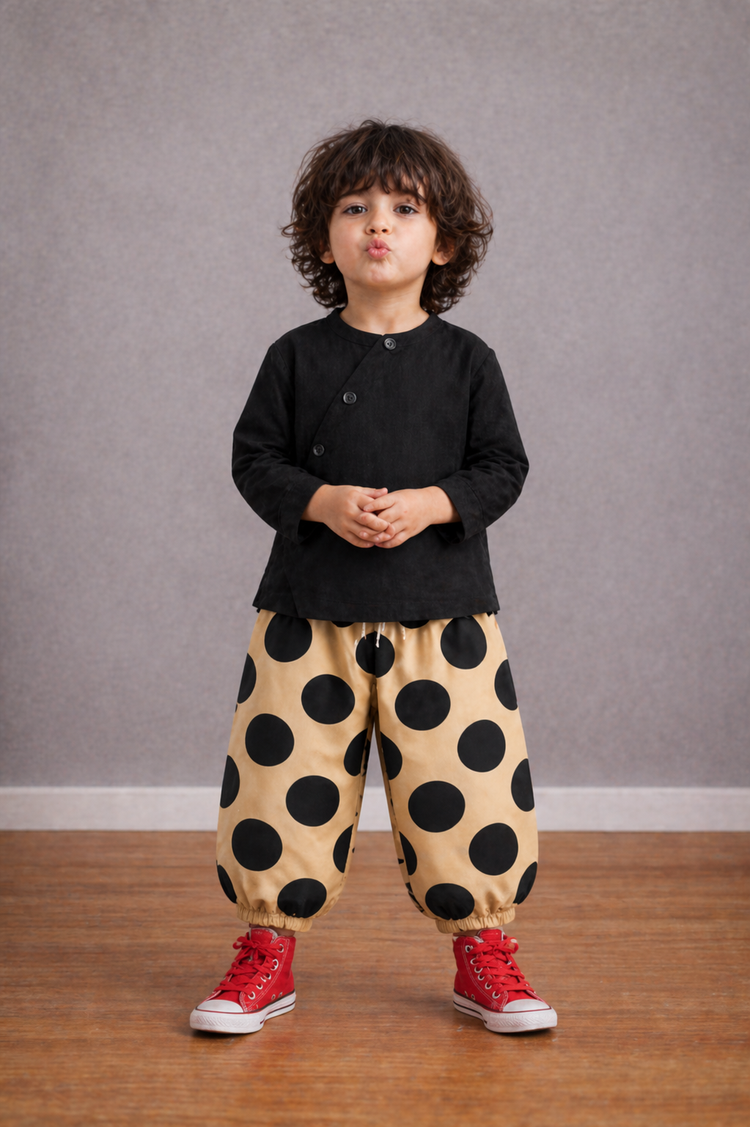 Boy wearing Anaario Midnight Dot Wrap Co-ord Set