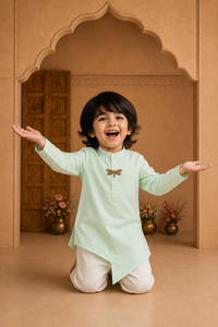 Mint dragonfly-motif asymmetrical kurta by Anaario - pose 1