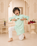 Mint dragonfly-motif asymmetrical kurta by Anaario - back view