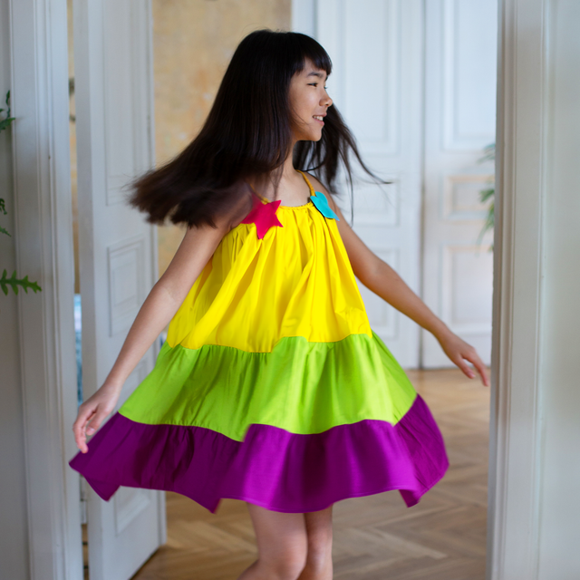 Girl wearing Anaario Serene Moon River Dress, Aqua Magic Print