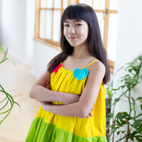 Girl wearing Anaario Serene Moon River Dress, Aqua Magic Print