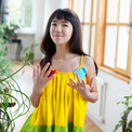 Girl wearing Anaario Serene Moon River Dress, Aqua Magic Print