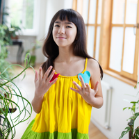Girl wearing Anaario Serene Moon River Dress, Aqua Magic Print