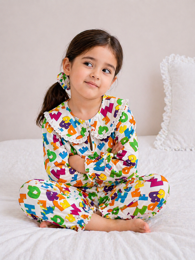 Girl wearing Anaario Neon Multicolor Alphabets Night Suit