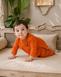 Baby wearing Anaario Orange Rabbit-Motif Baby Kurta Set, orange kurta with rabbit motif, newborn to 24 months