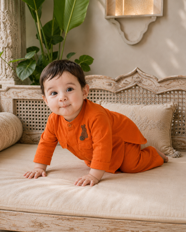Baby wearing Anaario Orange Rabbit-Motif Baby Kurta Set, orange kurta with rabbit motif, newborn to 24 months