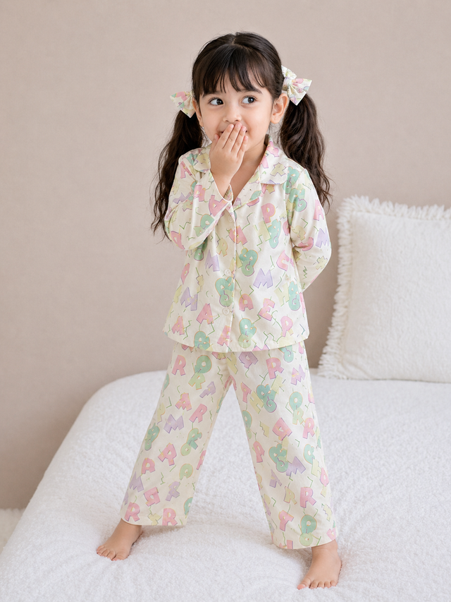 Girl wearing Anaario Pastel Alphabets Night Suit