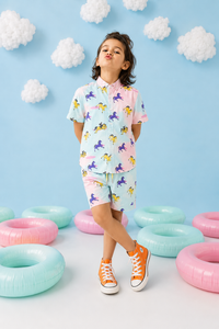 Boy wearing Anaario Pastel Horse Shorts