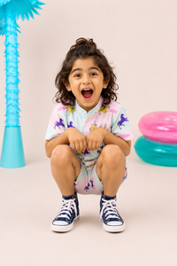 Boy wearing Anaario Pastel Horse Shorts
