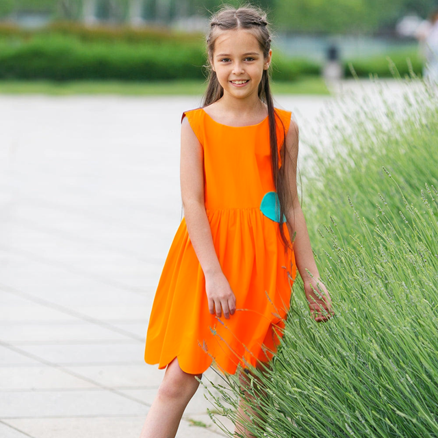 Girl wearing Anaario Playful Peekaboo Dress, Aqua Magic Print