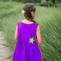 Girl wearing Anaario Playful Peekaboo Dress, Aqua Magic Print