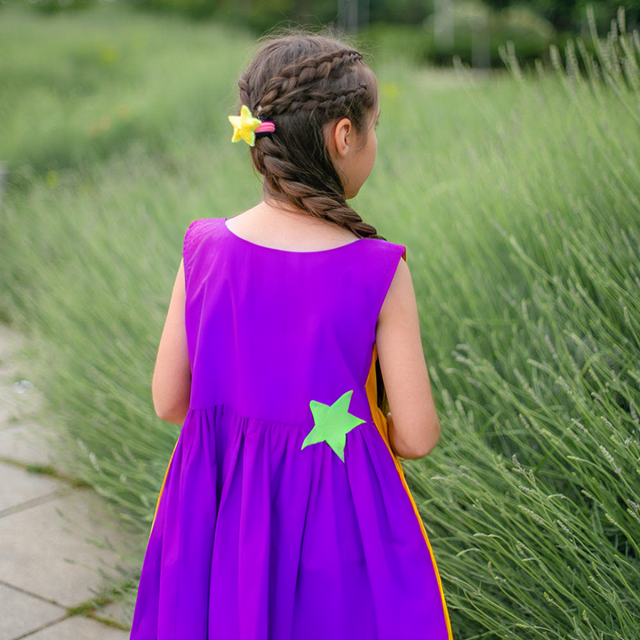Girl wearing Anaario Playful Peekaboo Dress, Aqua Magic Print