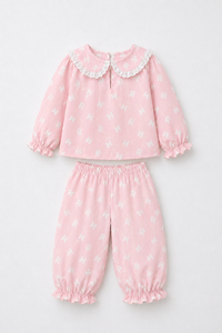 Girl wearing Anaario Pink Alphabet Night Suit