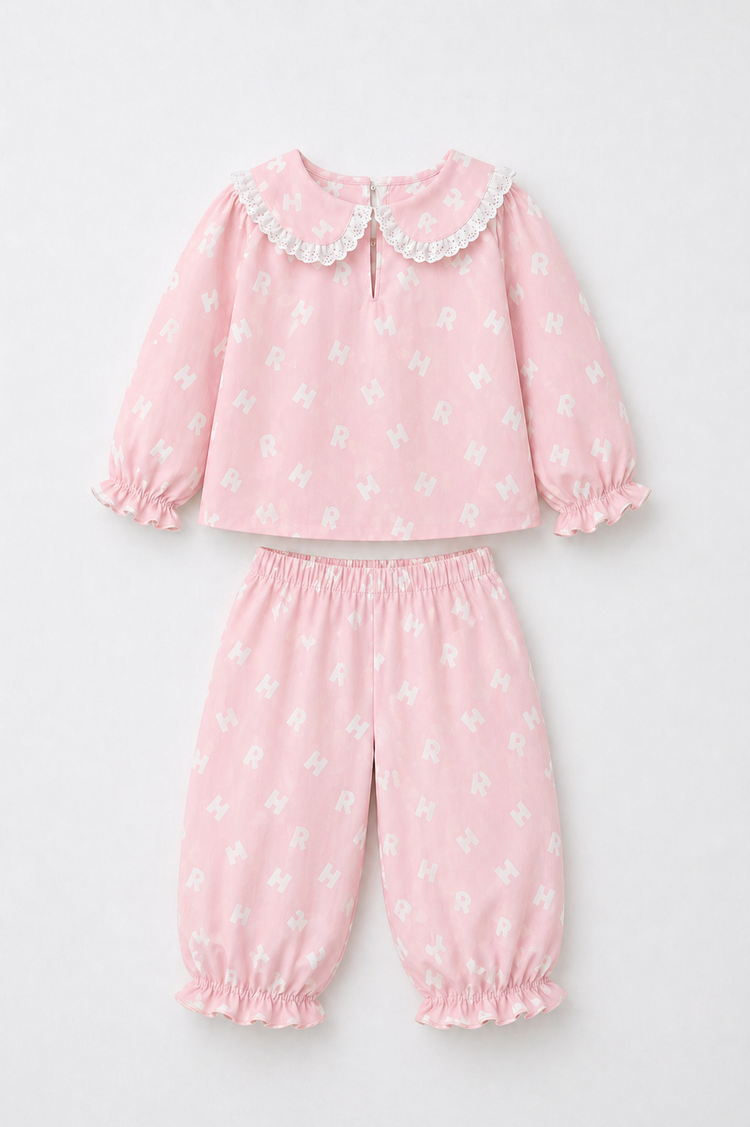 Girl wearing Anaario Pink Alphabet Night Suit