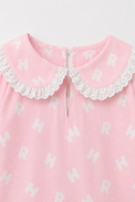 Girl wearing Anaario Pink Alphabet Night Suit