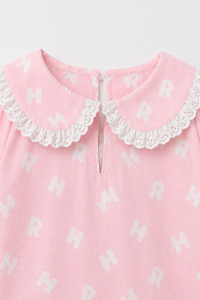 Girl wearing Anaario Pink Alphabet Night Suit