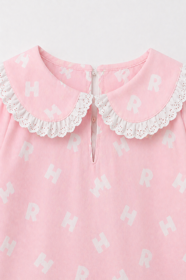 Girl wearing Anaario Pink Alphabet Night Suit